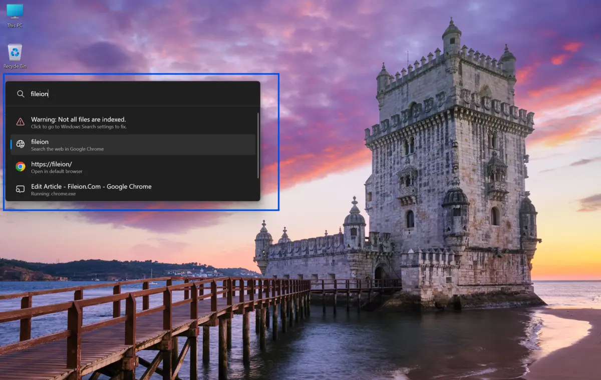 Lisbon's Bel&eacute;m Tower beside a wooden walkway extending over water, with a search bar displaying browser history and URL on a computer screen.